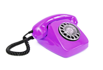 Purple retro telephone isolated on white background