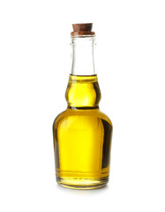 Glass bottle with olive oil on white background