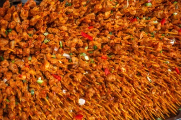 Summer meat skewers pile up on the grill