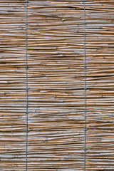 close up texture of rug made of bamboo sticks