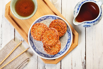 White lotus seed paste mooncake with egg yolk on the plate    