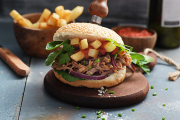 burger pulled pork on grey background.