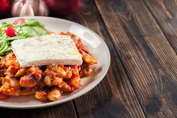 Baked giant beans with feta cheese