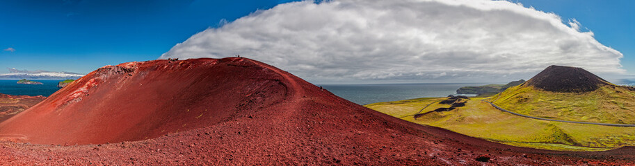 Big panorama of city of Heimaey taken from the top of Eldfell volcano.