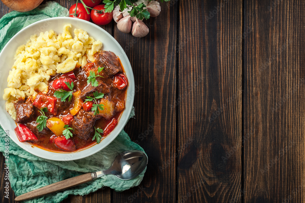 Wall mural hungarian beef goulash serwed with galuska noodles