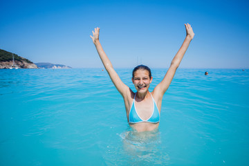 Happy young girl enjoy beach vacation