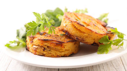 polenta galette with cheese and vegetable