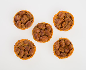 Cookies or peanut cracker on background.