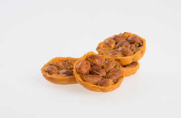 Cookies or peanut cracker on background.