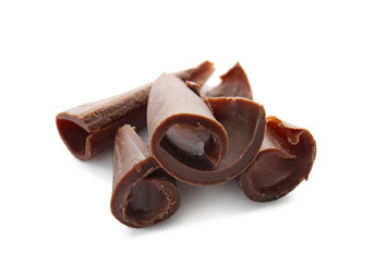 Chocolate curls on white background