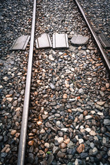 Two ways crossing / Railway track at stony ground with crossing by simple footpath