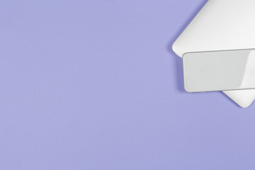 Colored office desk table with computer. Top view with copy space