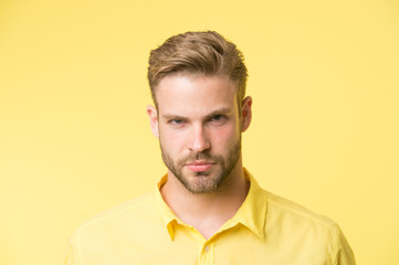 Masculinity concept. Man with beard or unshaven guy looks handsome and well groomed. Guy bearded...