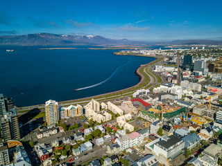Reykjavik from yhe top. Iceland capital in summer sunny daytime. Aerial photo - obrazy, fototapety, plakaty