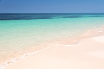 Sand and caribbean sea background