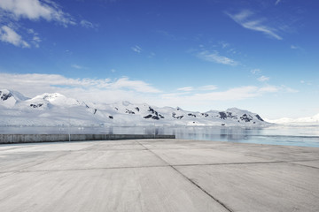 empty brick ground with sonw mountain as background