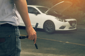 Close up wrench in my hands to repair the broken down car.