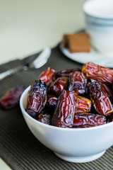 Organic dried dates fruit in a bowl