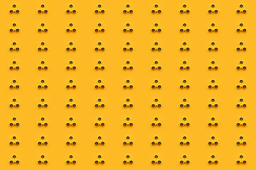 Seamless pattern background of yellow fidget spinner toy