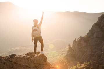 Beautiful woman on the top of mountain 