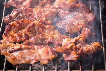 Grilled pork cutlets,on a charcoal grill.