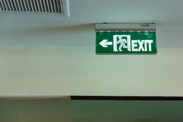 Fire exit light sign in the building.