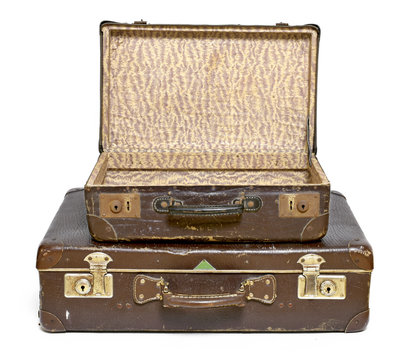 Old suitcase, travel item, luggage or baggage. Vintage suitcase, retro, leather suitcase, isolated on white background.