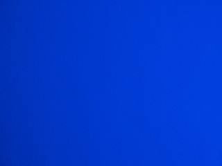 Grain blue paint wall background or texture
