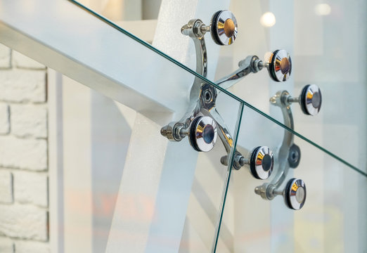 Glass facades and walls. Metal fasteners.