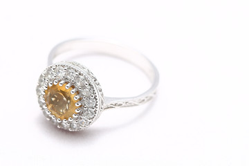 Yellow gem stone and diamond ring