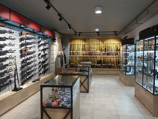 KHARKOV, UKRAINE, June 6, 2018: Showcases in the arms store with rifles, cartridges and pistols
