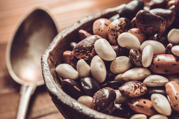Pile of Colorful Beans on Dark Wooden Background