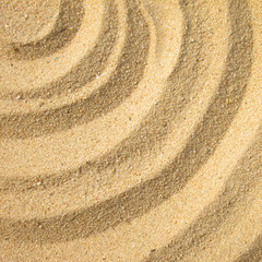 Fototapeta na wymiar A circular sand swirl background texture abstract