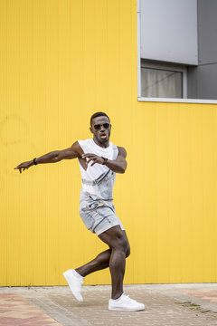 African man practicing break dance.