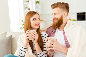 Friendship coziness day speak communication tenderness look partners happiness warmth concept. Portrait of gentle cute lovely  sweet couple drinking hot green tea laughing telling interesting news