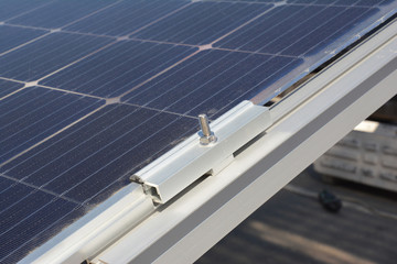 Close up on solar panels holder installation.