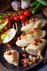 Rustic Cepelinai, a specialty Lithuanian and Polish cuisine.