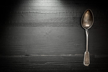 Rustic Cutlery on Old Dark Wooden Background. Silverware and Food Concept.