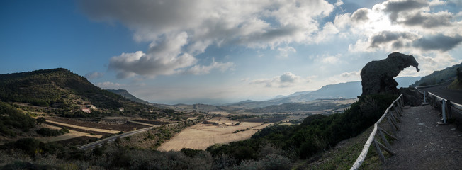 Obraz premium Panoramic picture with elephants made of stone 