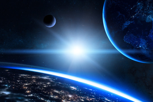Earth in the outer space with beautiful planet. Blue sunrise. Elements of this image furnished by NASA.