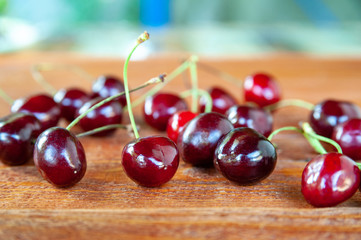 Sweet cherry on a wooden background