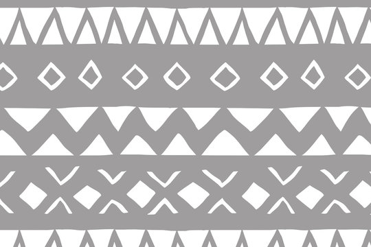 White and gray geometric background. Ethnic hand drawn pattern