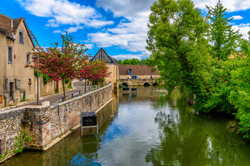 Fototapeta na wymiar Eure River embankment with old houses in a small town Chartres, France