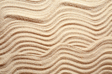 Fototapeta na wymiar Sand with pattern, closeup