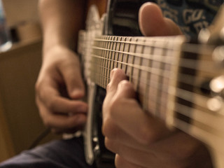 hand with guitar close-up5
