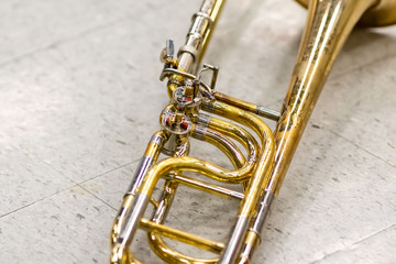 close up of a well used marching band trombone