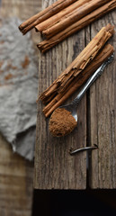 cinnamon sticks on wooden Board top view