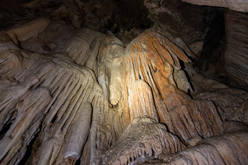 Stalactite and stalagmite inside coral cave at Khao Sok National Park,Thailand.