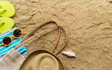 Fototapeta na wymiar Beach Accessories On Table On Beach - Summer Holidays