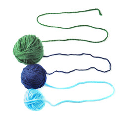Balls of knitting yarn on white background